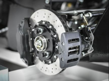 How Do You Properly Maintain Your Car's Brakes, and What Are Some Signs That Your Brakes Need to Be Serviced or Replaced?