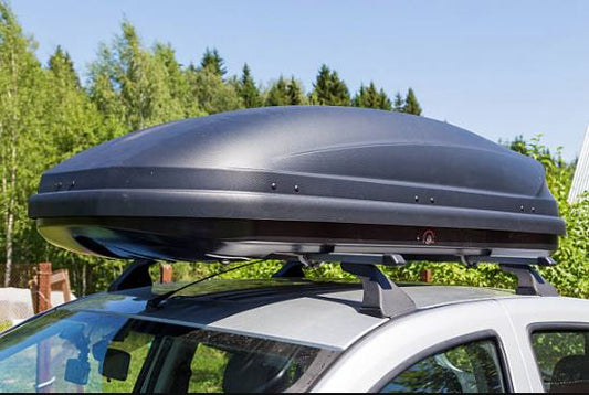 How Does Using a Roof Rack or Cargo Carrier Affect a Vehicle's Aerodynamics and Fuel Efficiency?