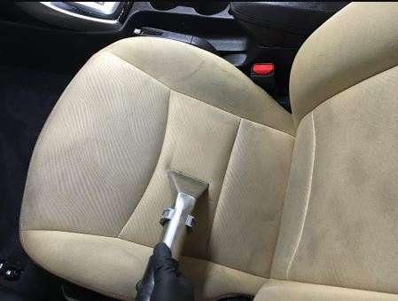 What's the Best Way to Remove Stubborn Stains From My Car's Upholstery or Carpet?