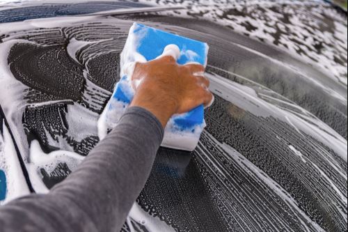 How Do You Properly Clean and Treat Your Car's Exterior to Protect It From Winter Weather Conditions?