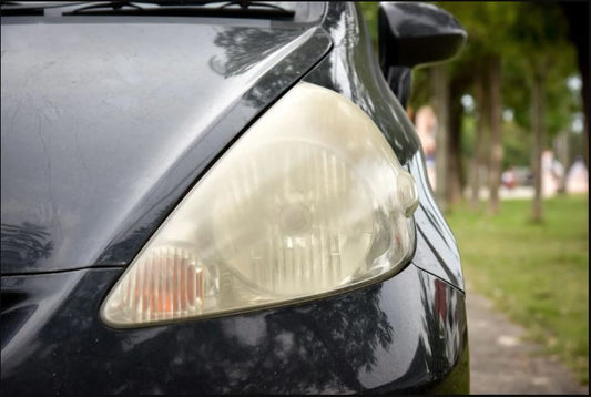How Do I Properly Clean and Maintain the Headlights and Taillights for Optimal Visibility?