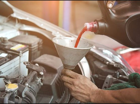What is the Recommended Interval for Changing Your Car's Transmission Fluid, and What Are Some Signs That It Needs to Be Changed?